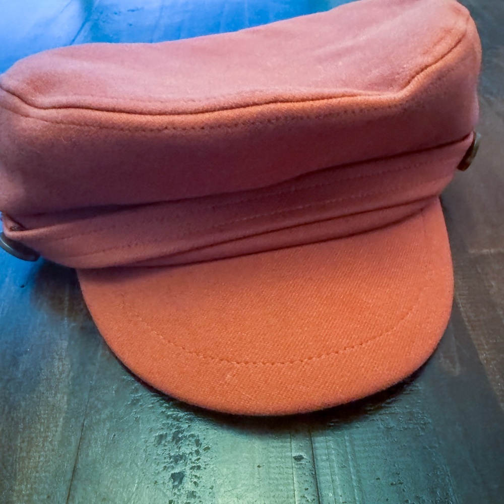 Orange beret-style cap with brim